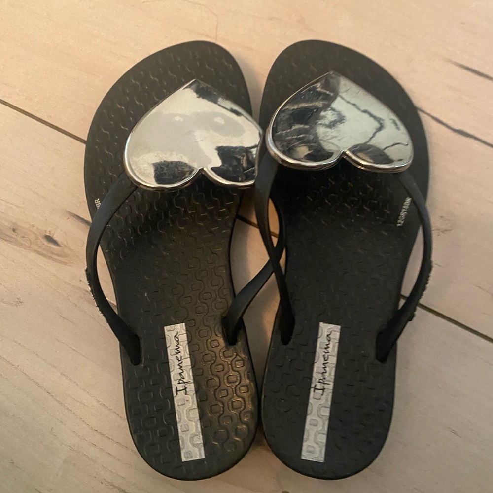 Kids size 11/12 Black Flip Flops with Silver Heart Accents